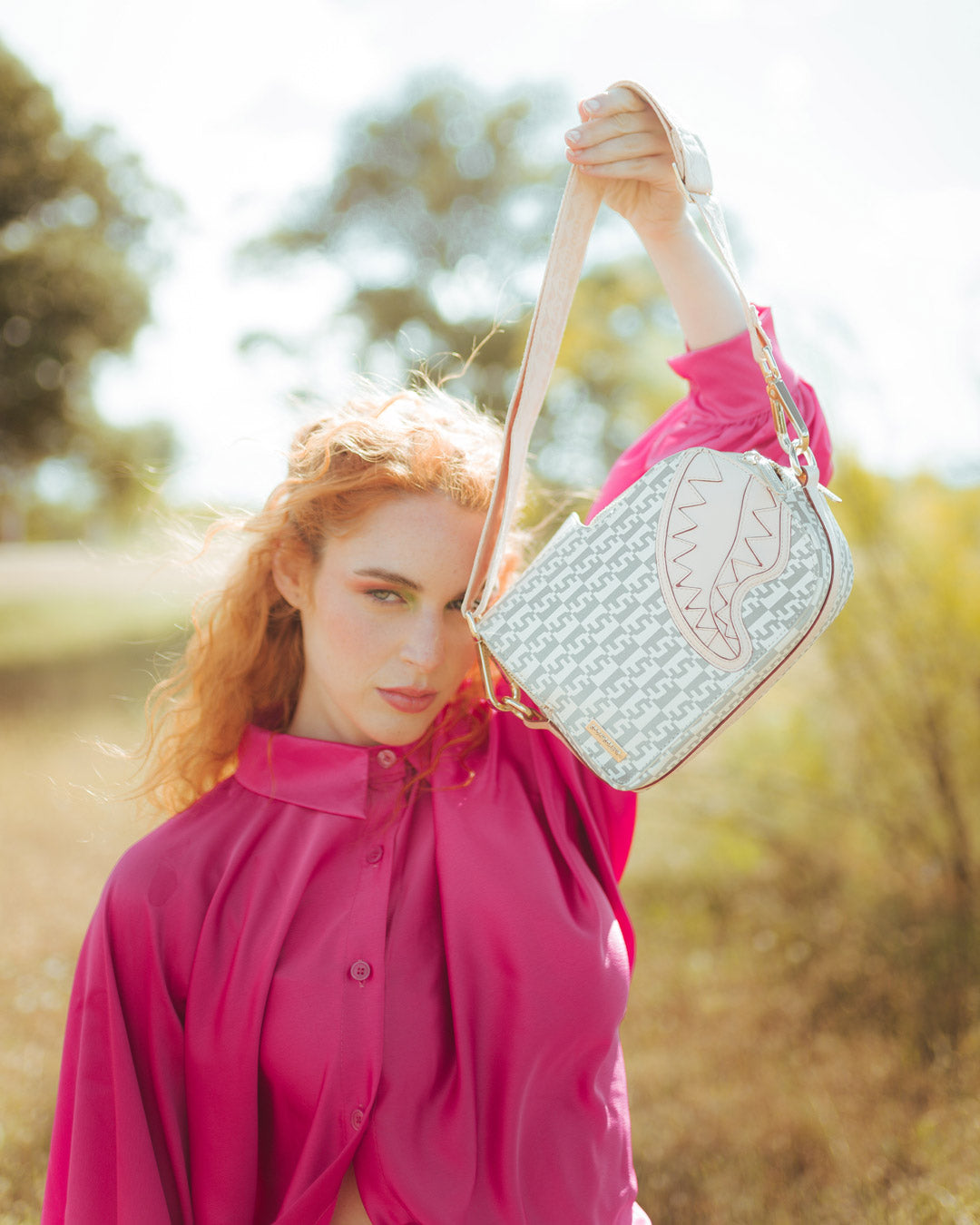 CR?ME DE LA CR?ME BACKPACK SLING
