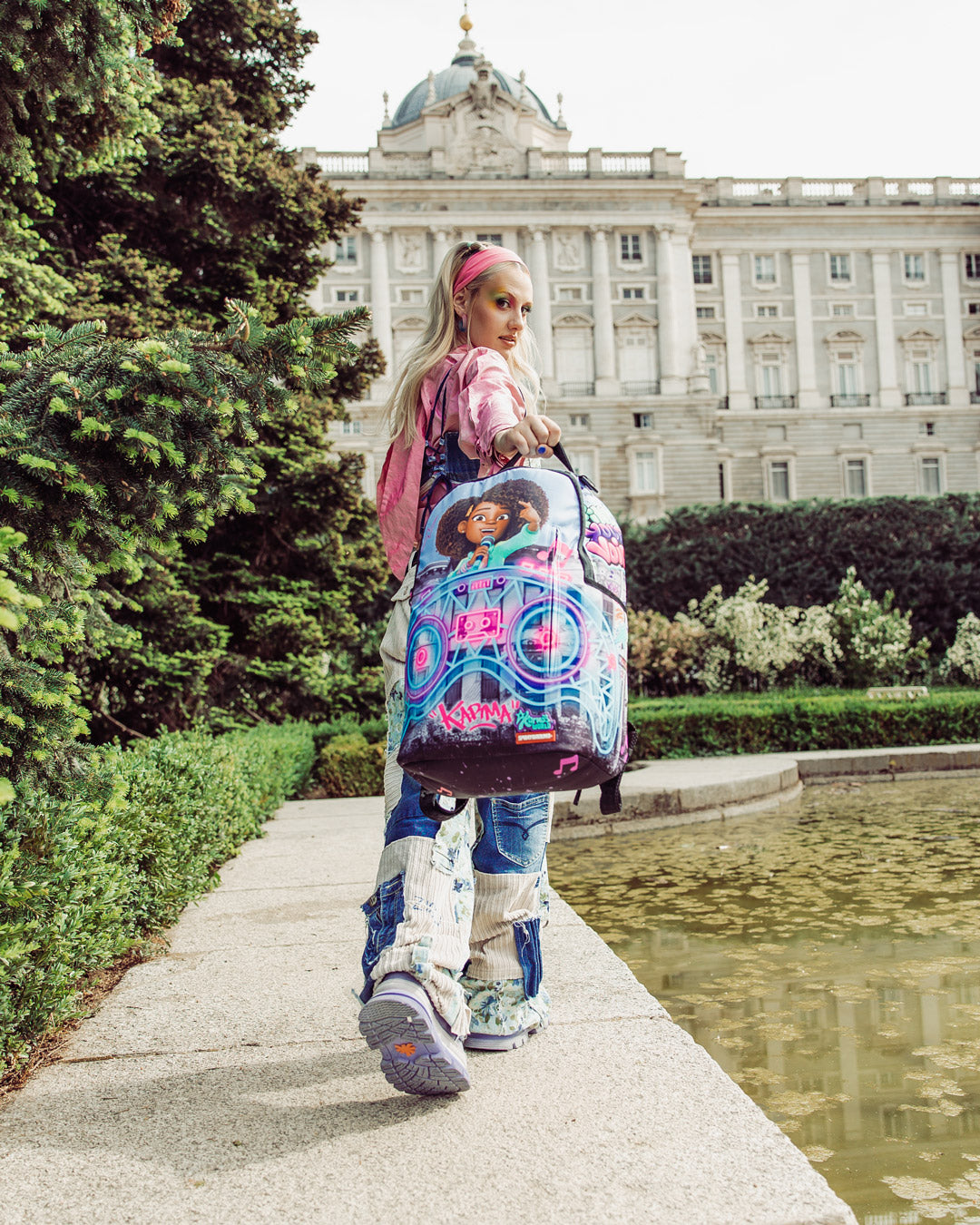 KARMA'S WORLD TURN UP THE VOLUME BACKPACK